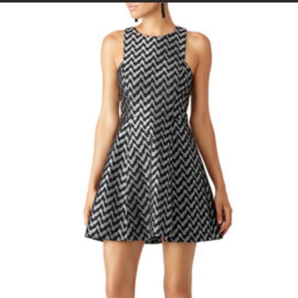 Likely silver and black mini dress